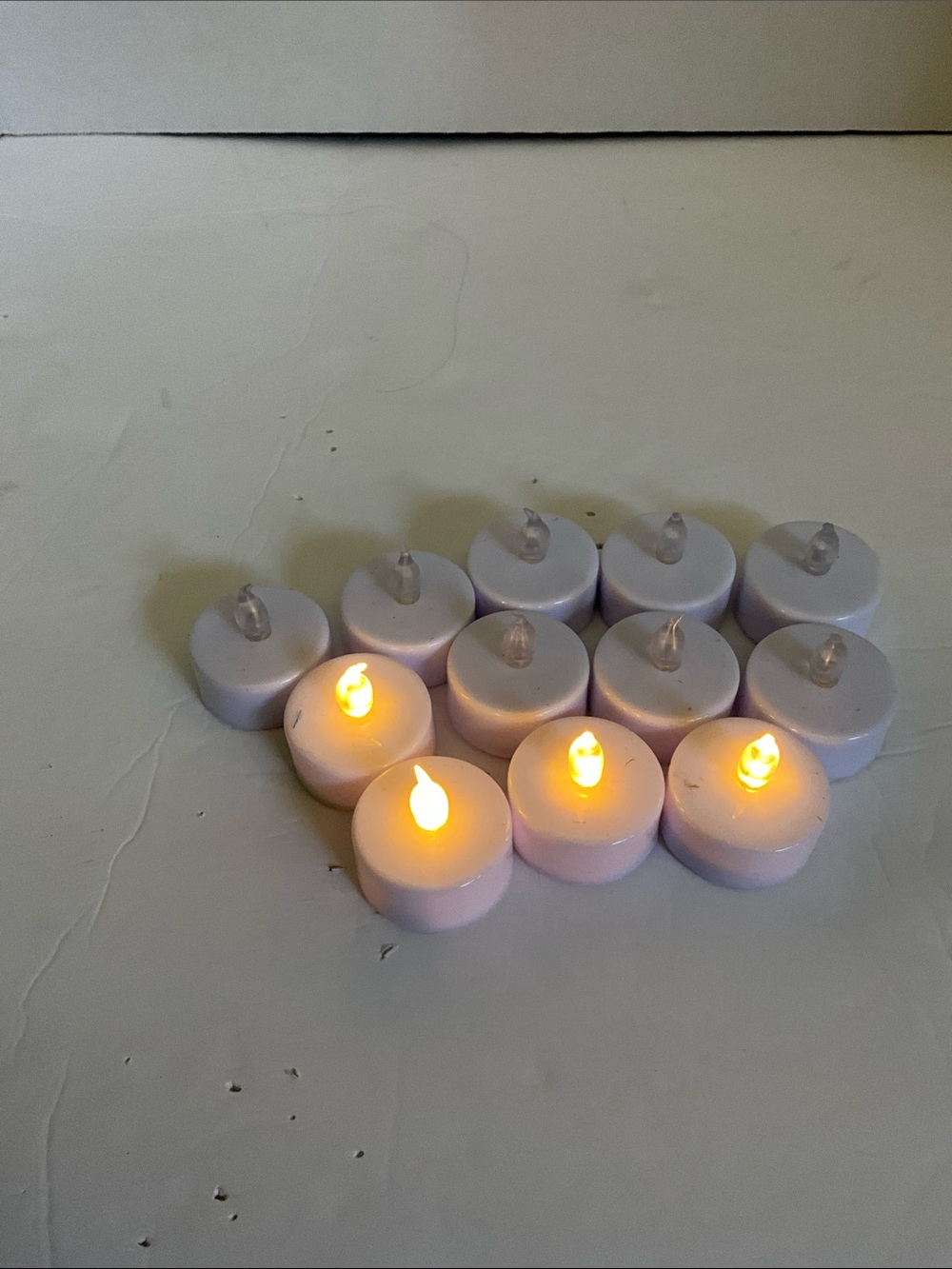 Battery LED Tealight Candles - White Flickering Flame (Set of 12)